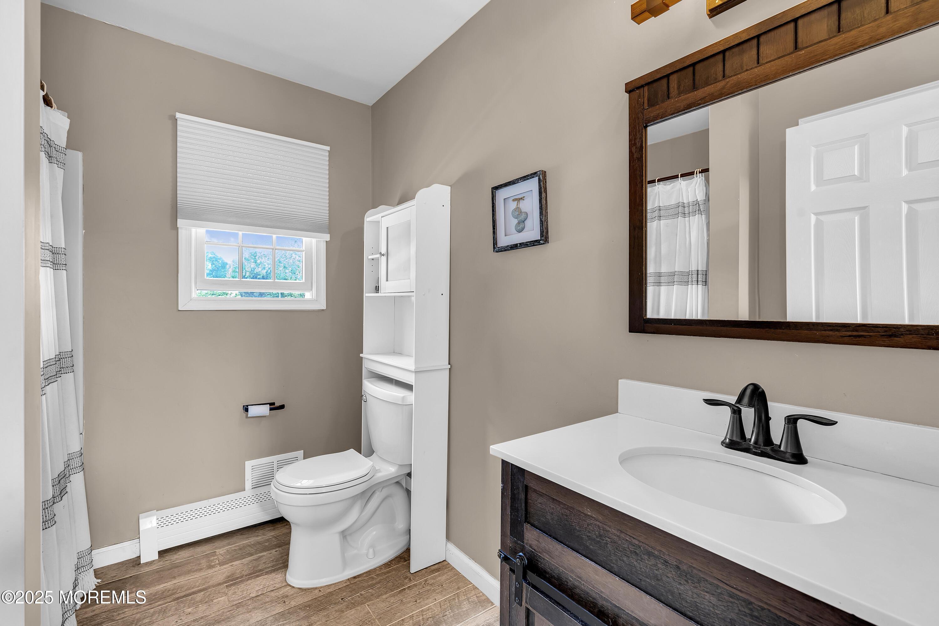 40 Centerville Road Holmdel, NJ 07733 - Photo 44 of 60 a bathroom with a sink toilet and a mirror