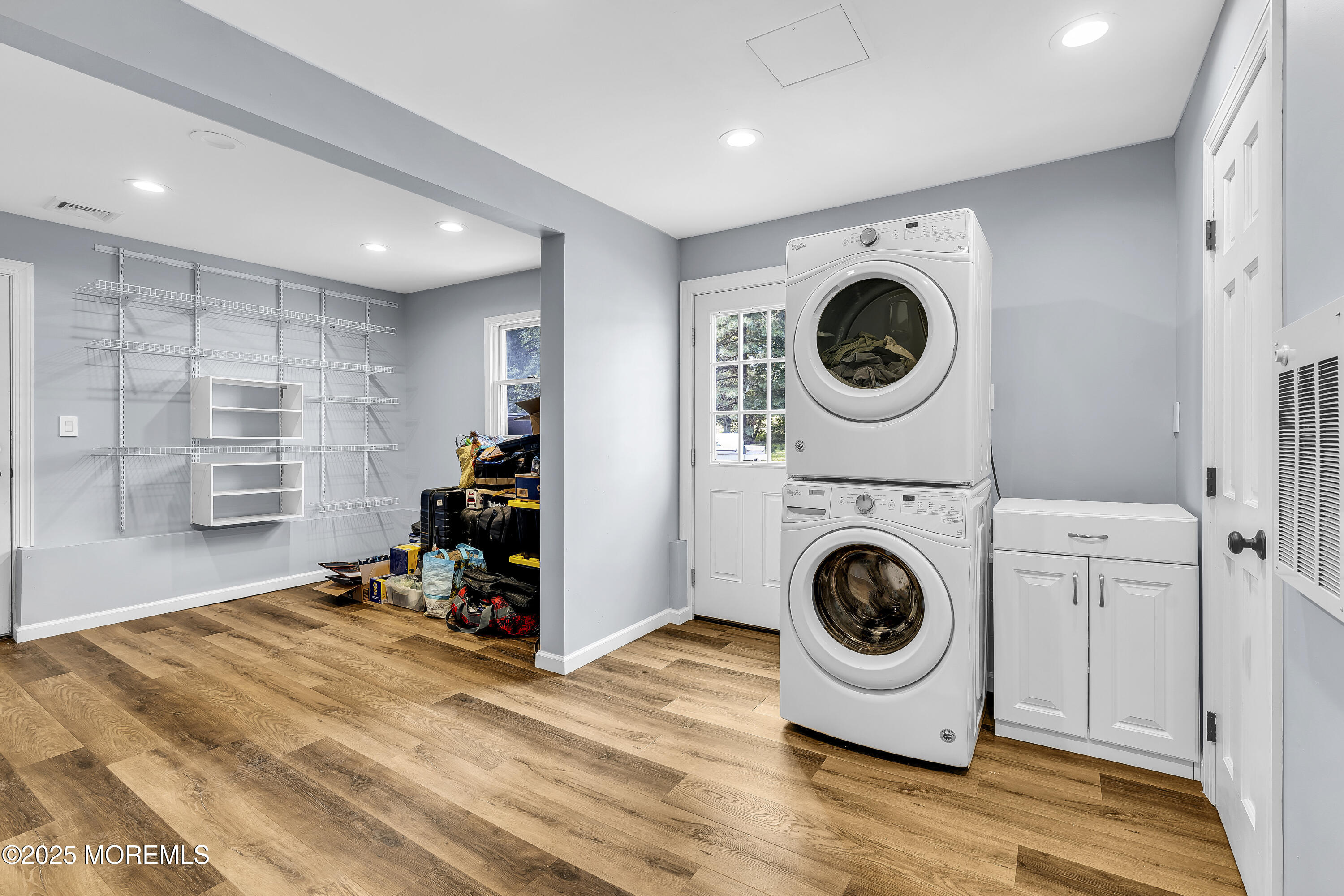 40 Centerville Road Holmdel, NJ 07733 - Photo 45 of 60 a view of a storage & utility room with a washer dryer