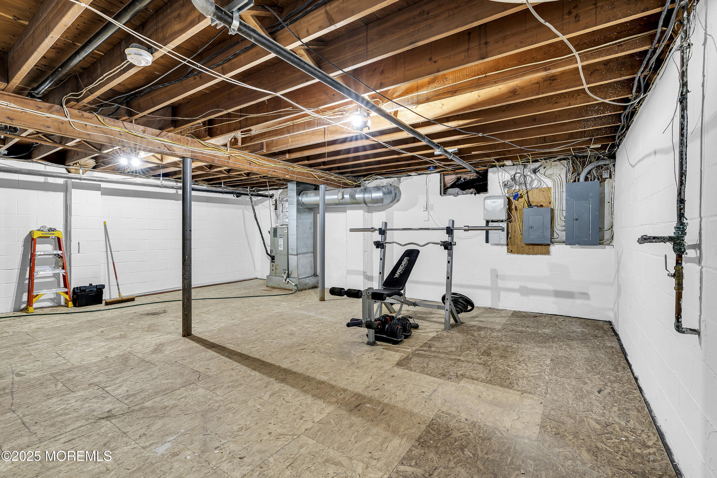 40 Centerville Road Holmdel, NJ 07733 - Photo 46 of 60 a view of a gym room with gym equipment