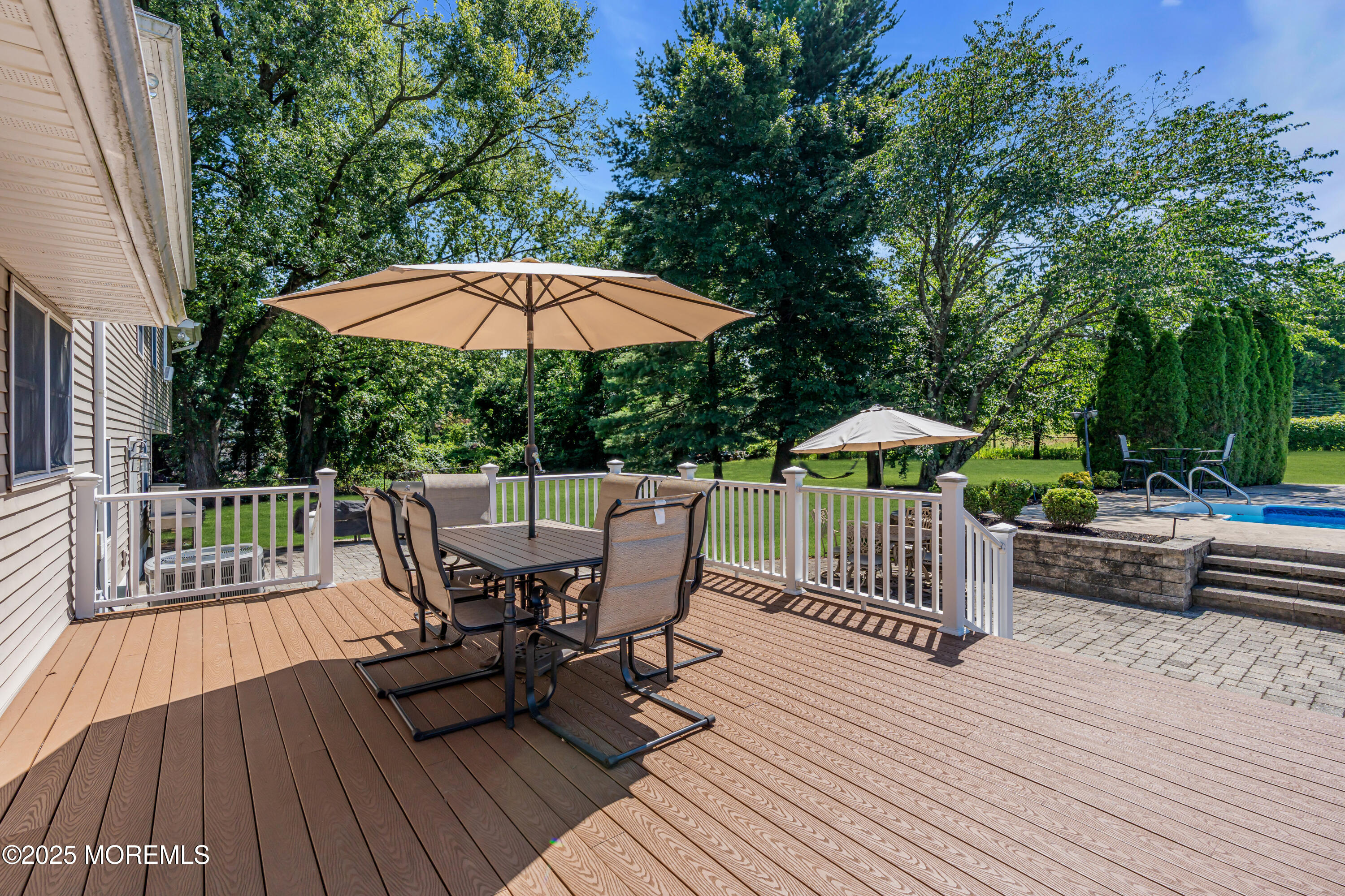 40 Centerville Road Holmdel, NJ 07733 - Photo 51 of 60 a view of a deck with furniture