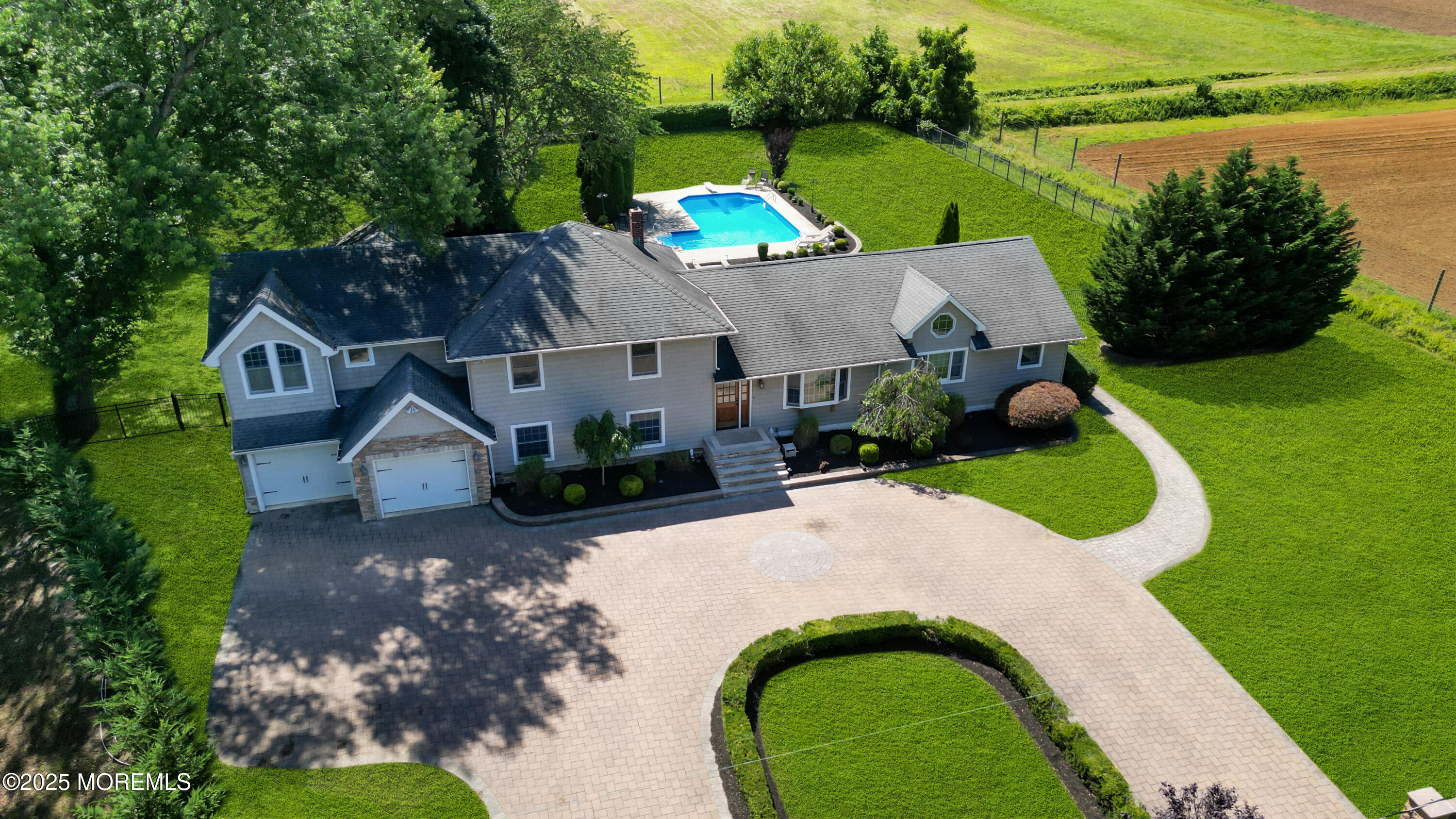 40 Centerville Road Holmdel, NJ 07733 - Photo 59 of 60 an aerial view of a house with garden space and lake view