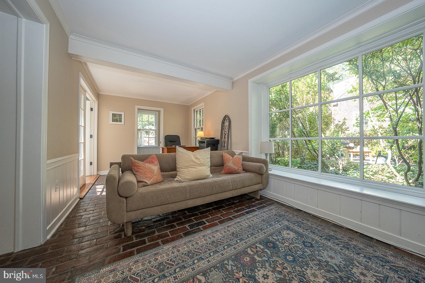 312 Windsor Avenue Wayne, PA 19087 - Photo 15 of 34 Den with brick floors and picture window