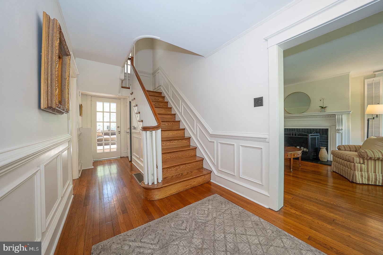 312 Windsor Avenue Wayne, PA 19087 - Photo 5 of 34 Foyer with hardwood floors and wainscoting