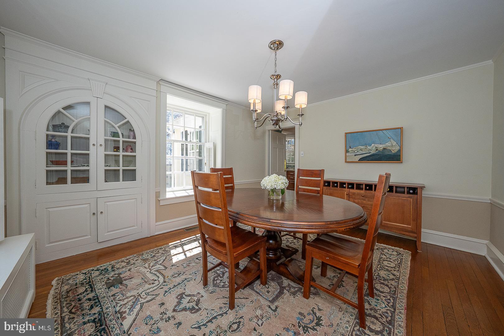 312 Windsor Avenue Wayne, PA 19087 - Photo 8 of 34 Dining Room with built-ins and hardwood floors