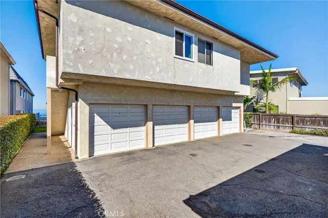 a view of a house with a street