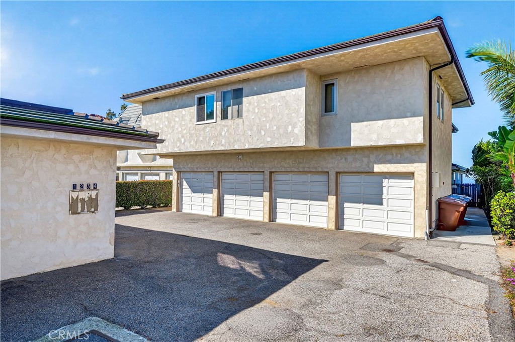 34381 Dana Strand Road, Unit 2 Dana Point, CA 92629 - Photo 23 of 42 a view of a house with a outdoor space