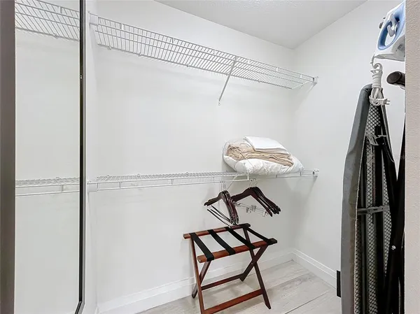 a view of a room with rack on the wall