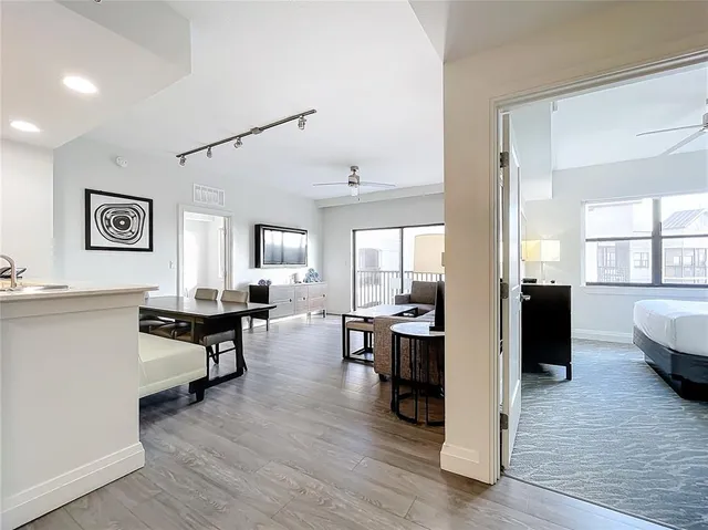 a view of a living room and dining room