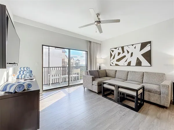 a living room with furniture and a window