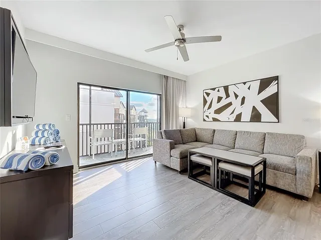 a living room with furniture and a window