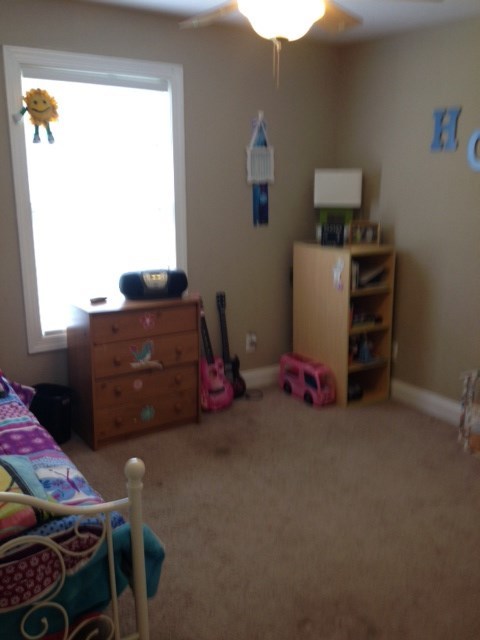 331 Lite-N-Tie Road Gray, GA 31032 - Photo 13 of 15 a room with furniture a desk and a window