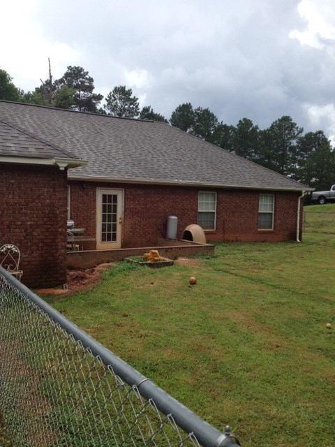 331 Lite-N-Tie Road Gray, GA 31032 - Photo 15 of 15 a front view of house with yard barbeque oven and outdoor seating