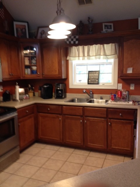 331 Lite-N-Tie Road Gray, GA 31032 - Photo 4 of 15 a kitchen with granite countertop a sink and cabinets