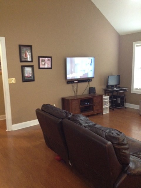 331 Lite-N-Tie Road Gray, GA 31032 - Photo 6 of 15 a living room with furniture and a flat screen tv