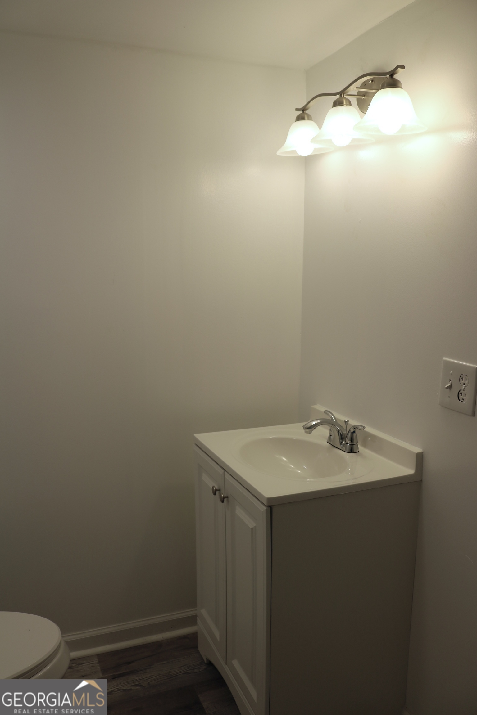 135 Chase Road LaGrange, GA 30241 - Photo 14 of 20 a bathroom with a sink and vanity