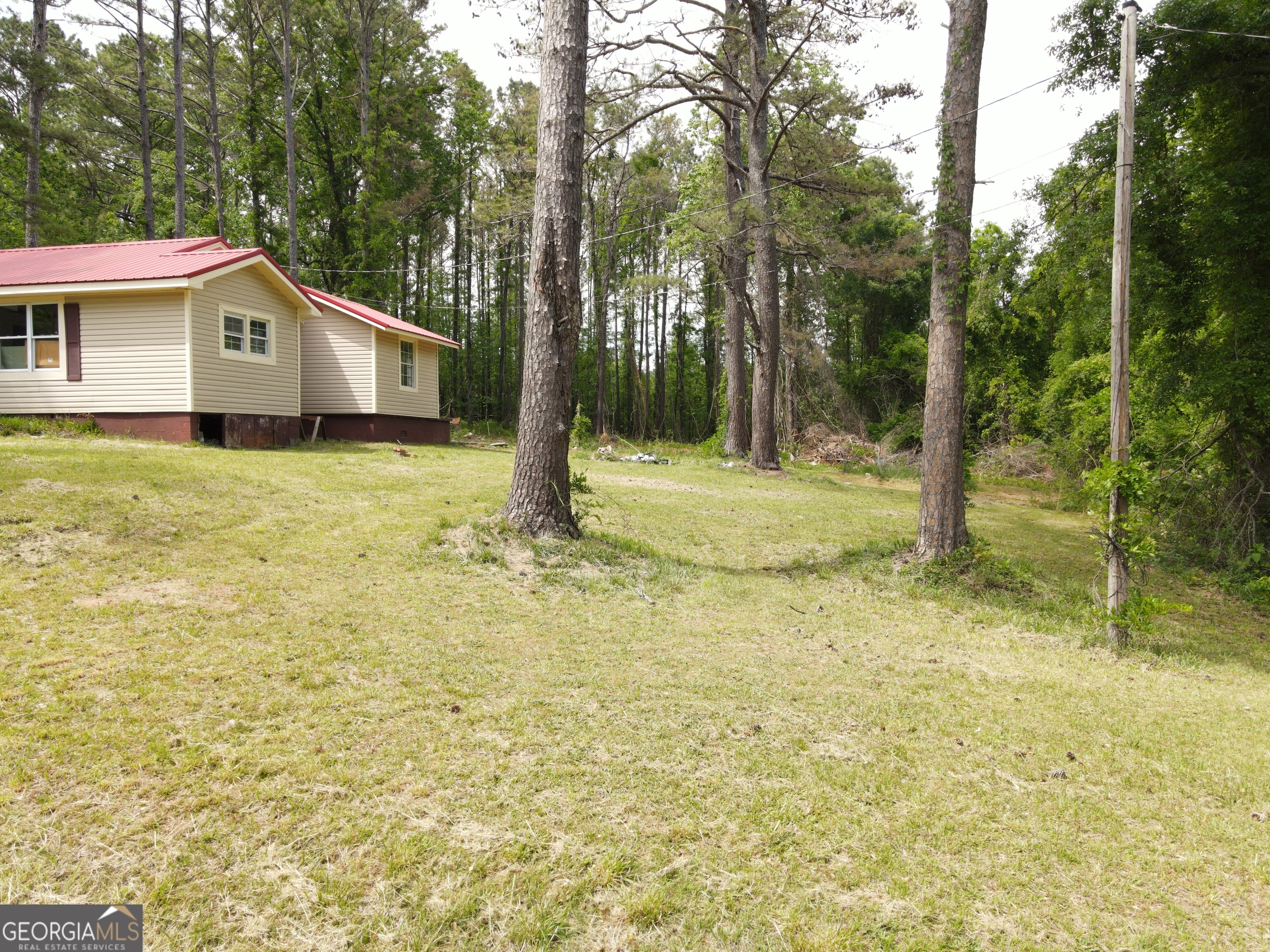 135 Chase Road LaGrange, GA 30241 - Photo 6 of 20 a front view of a house with a yard