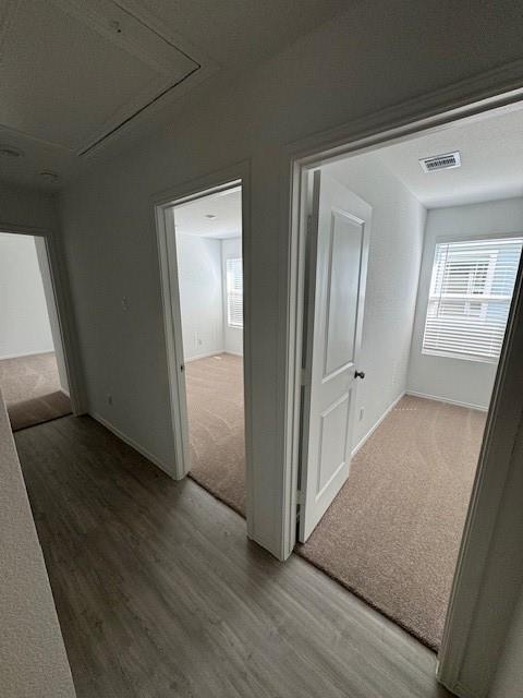 752 Soapstone Pass Maxwell, TX 78656 - Photo 5 of 8 a view of a hallway with wooden floor