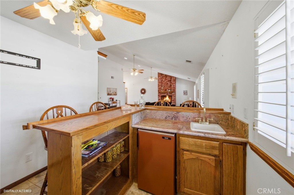 19670 Tonkawan Road Apple Valley, CA 92307 - Photo 15 of 70 Wet Bar and Mini Fridge