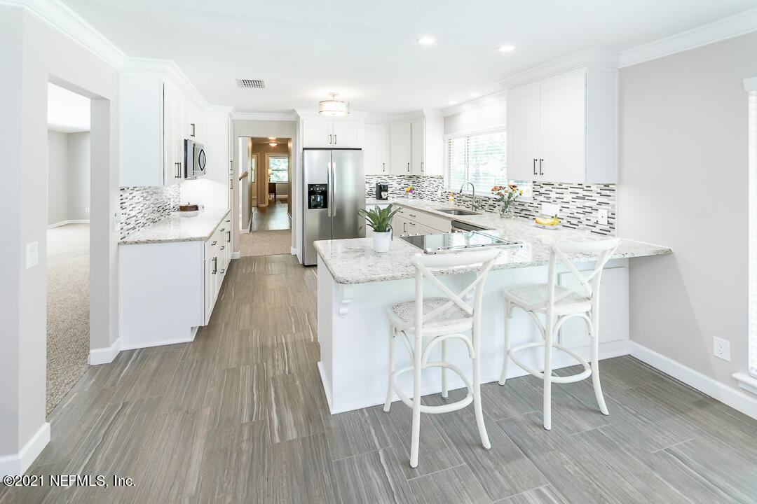 1420 Eddy Road Jacksonville, FL 32211 - Photo 16 of 30 eat in island in kitchen