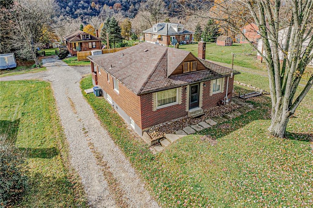 a view of a house with a park