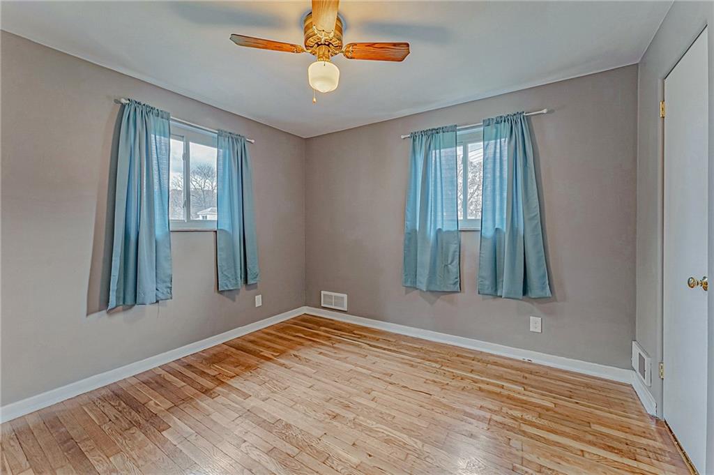 67 Noblestown Road Carnegie, PA 15106 - Photo 18 of 24 a view of a room with wooden floor and windows