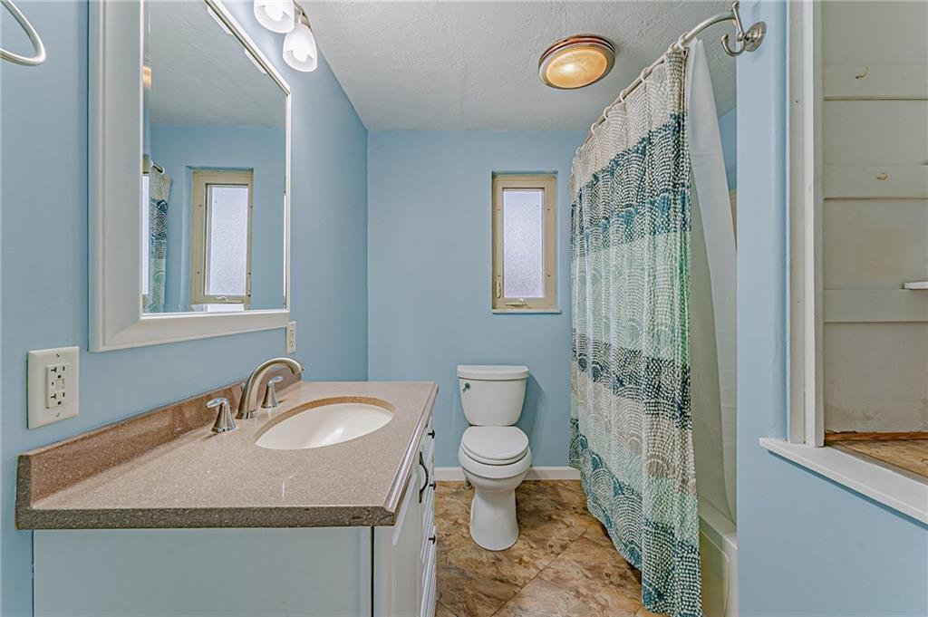 67 Noblestown Road Carnegie, PA 15106 - Photo 20 of 24 a bathroom with a sink toilet and shower