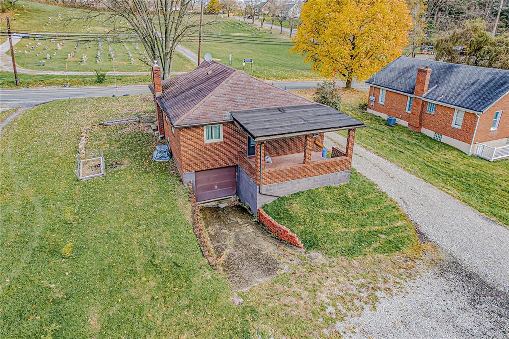 67 Noblestown Road Carnegie, PA 15106 - Photo 4 of 24 an aerial view of a house with a yard basket ball court and outdoor seating