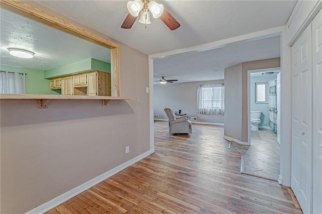 67 Noblestown Road Carnegie, PA 15106 - Photo 9 of 24 a view of a livingroom with furniture and wooden floor