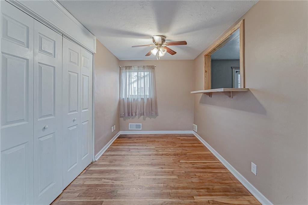67 Noblestown Road Carnegie, PA 15106 - Photo 10 of 24 wooden floor in an empty room with a window