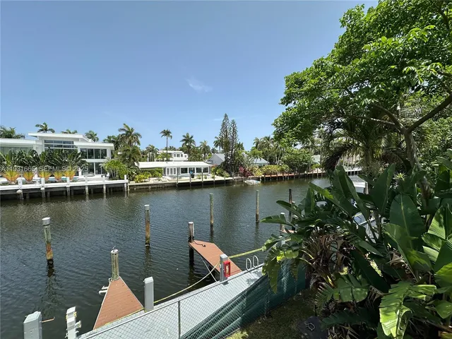 a view of a lake with houses
