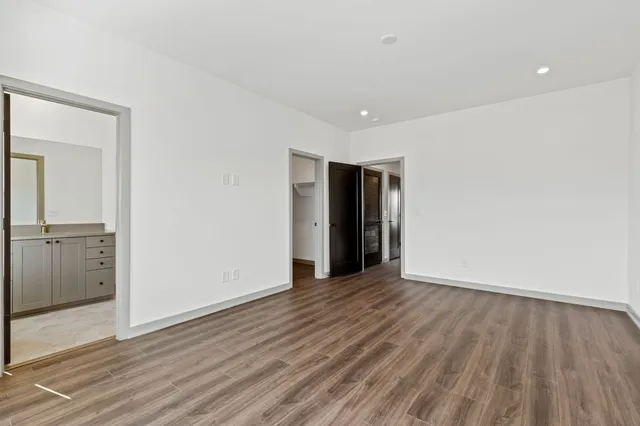 a view of a room with shelf on the wall