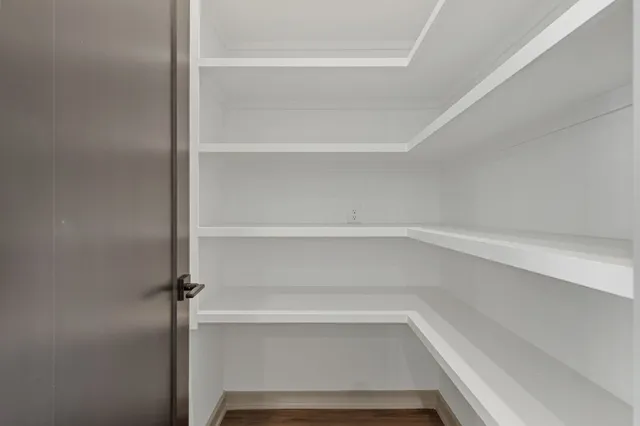 a view of a room with racks on the wall