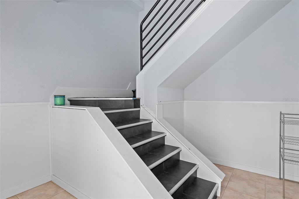 8229 Gulf Way Hudson, FL 34667 - Photo 7 of 35 a view of entryway and kitchen