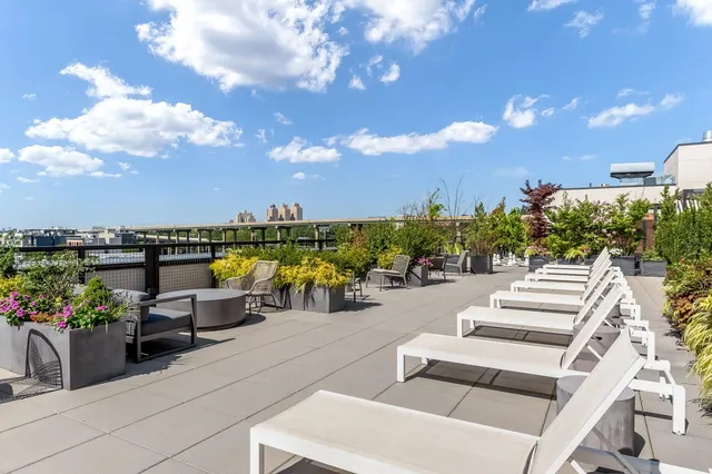 a view of a terrace with furniture