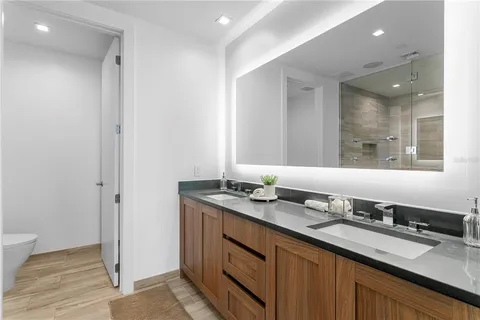 a bathroom with a shower and a toilet