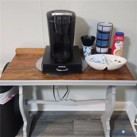 a room with a table and chairs