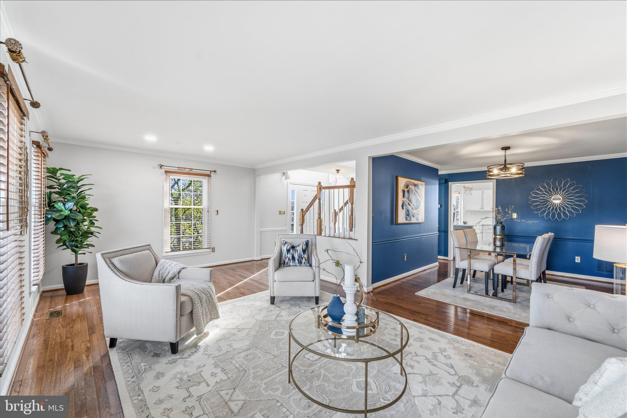 43451 Livery Square Ashburn, VA 20147 - Photo 22 of 51 a living room with furniture and a wooden floor
