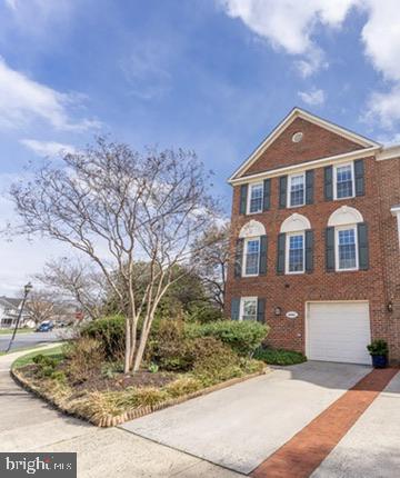 43451 Livery Square Ashburn, VA 20147 - Photo 3 of 51 a front view of a house with a yard