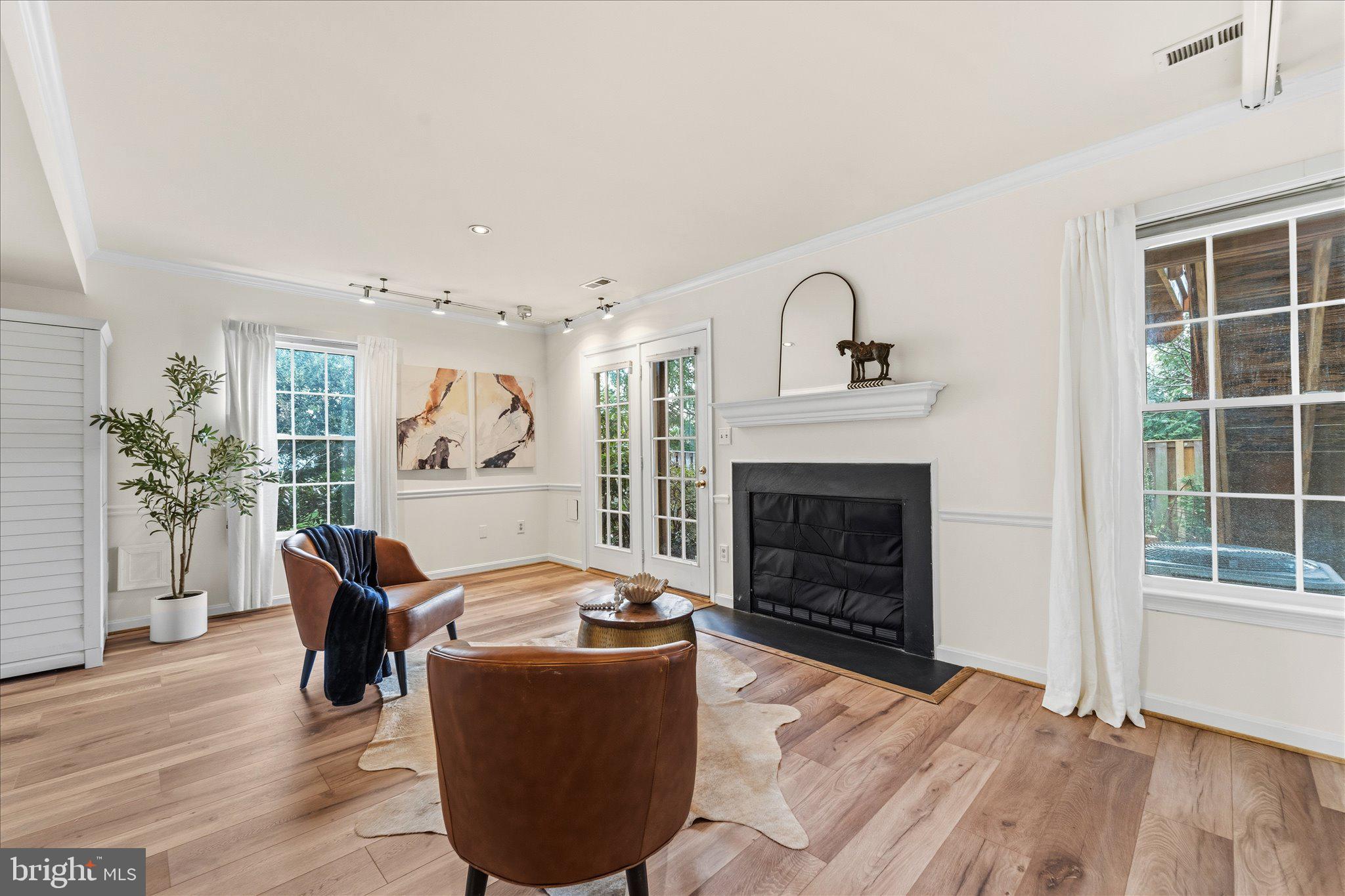 43451 Livery Square Ashburn, VA 20147 - Photo 38 of 51 a living room with furniture window and a fireplace