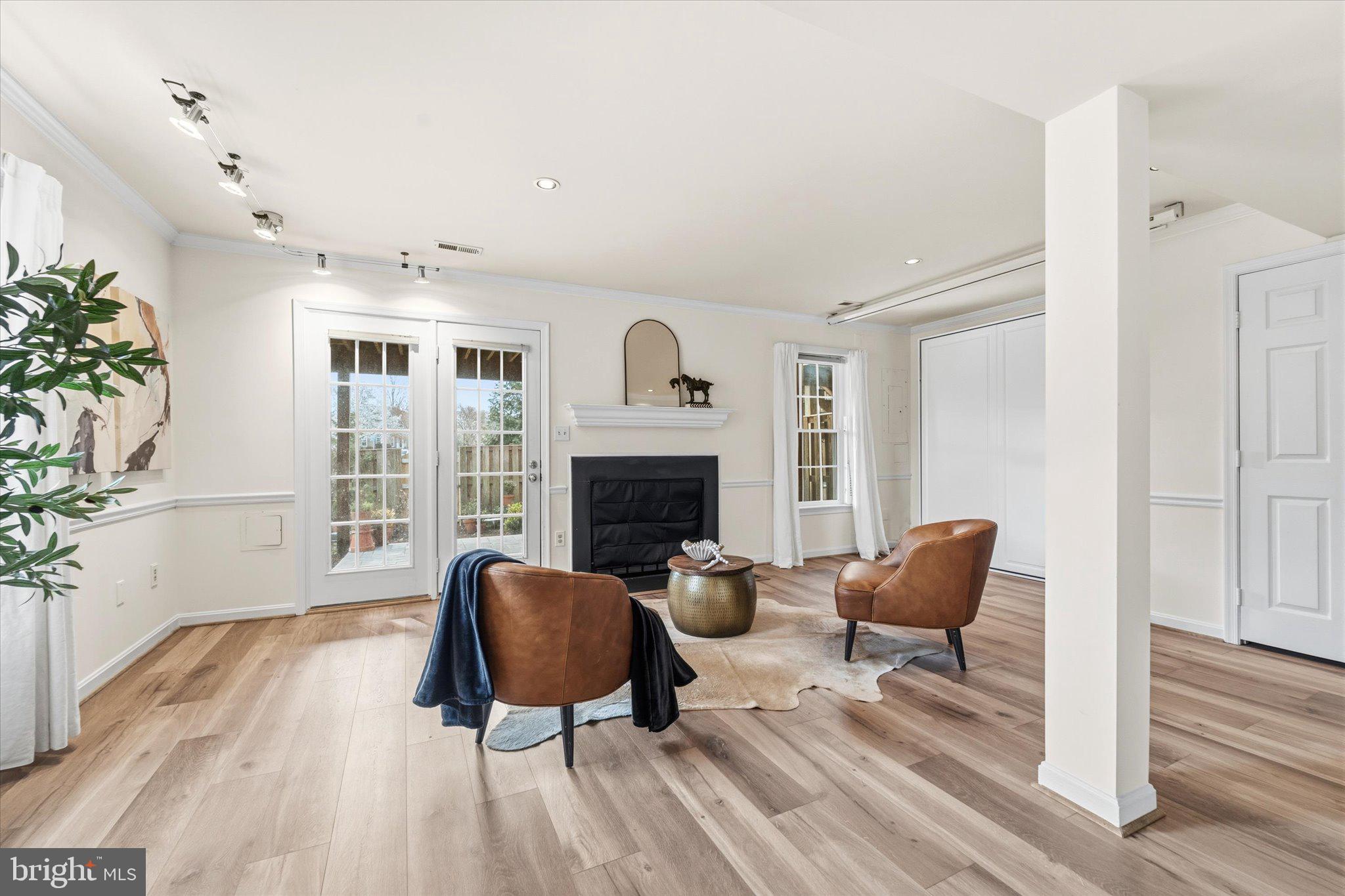 43451 Livery Square Ashburn, VA 20147 - Photo 39 of 51 a living room with furniture and a fireplace