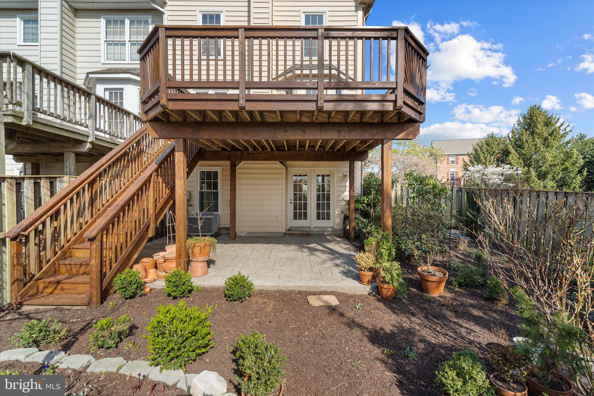 43451 Livery Square Ashburn, VA 20147 - Photo 44 of 51 a view of a house with a small yard and plants