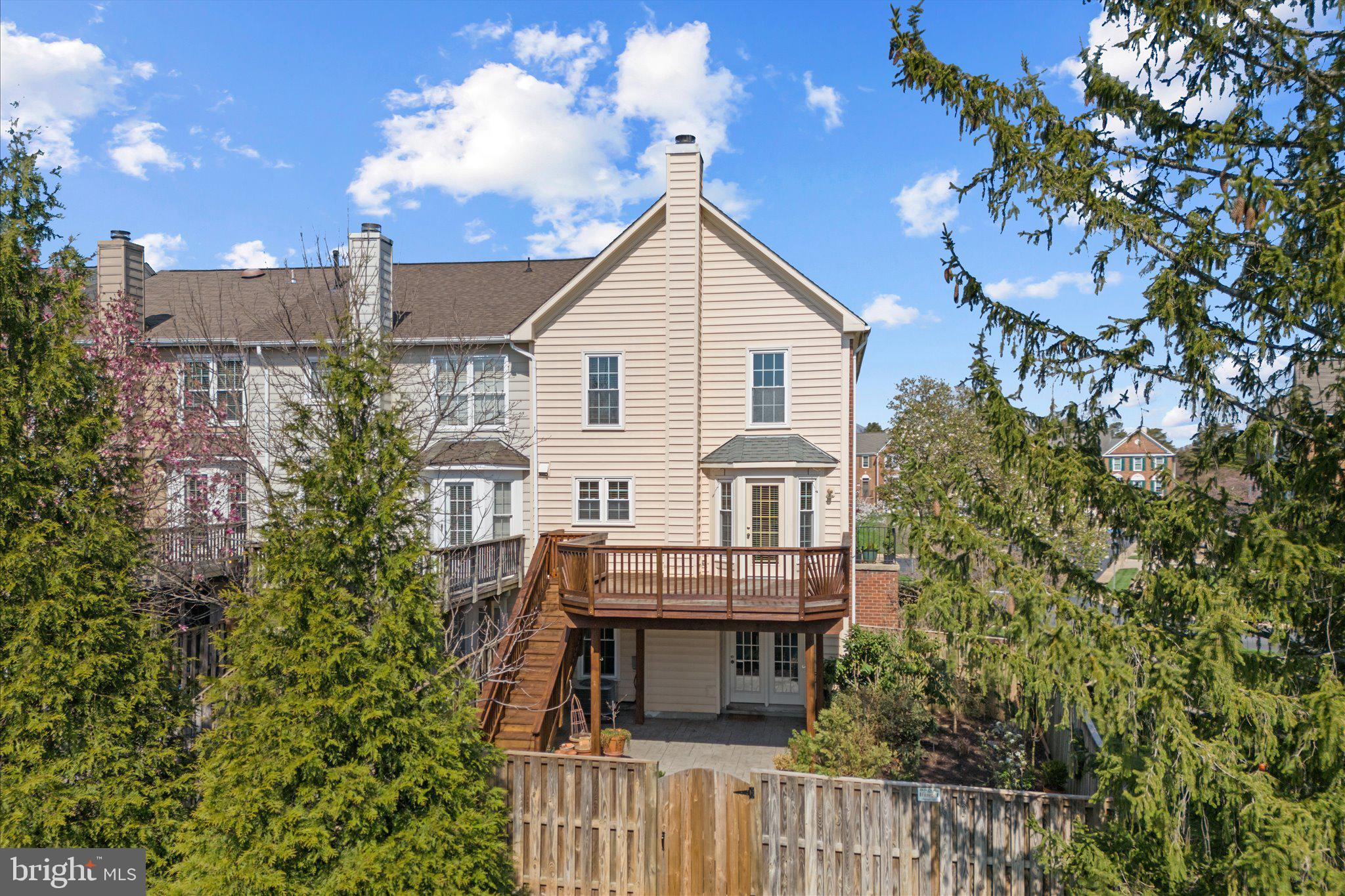 43451 Livery Square Ashburn, VA 20147 - Photo 45 of 51 a view of a house with a yard and plants