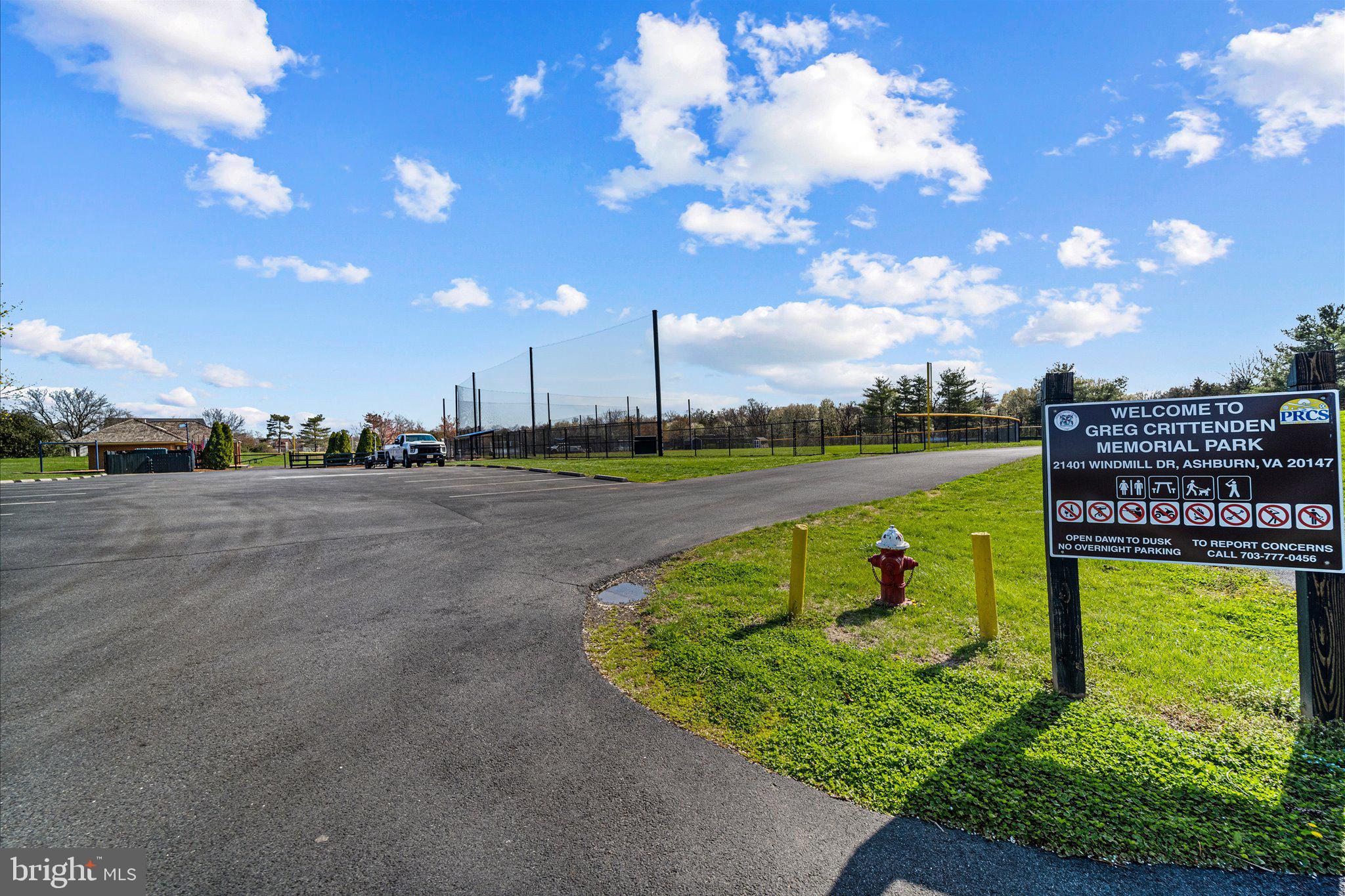 43451 Livery Square Ashburn, VA 20147 - Photo 49 of 51 a view of a lake with a big yard
