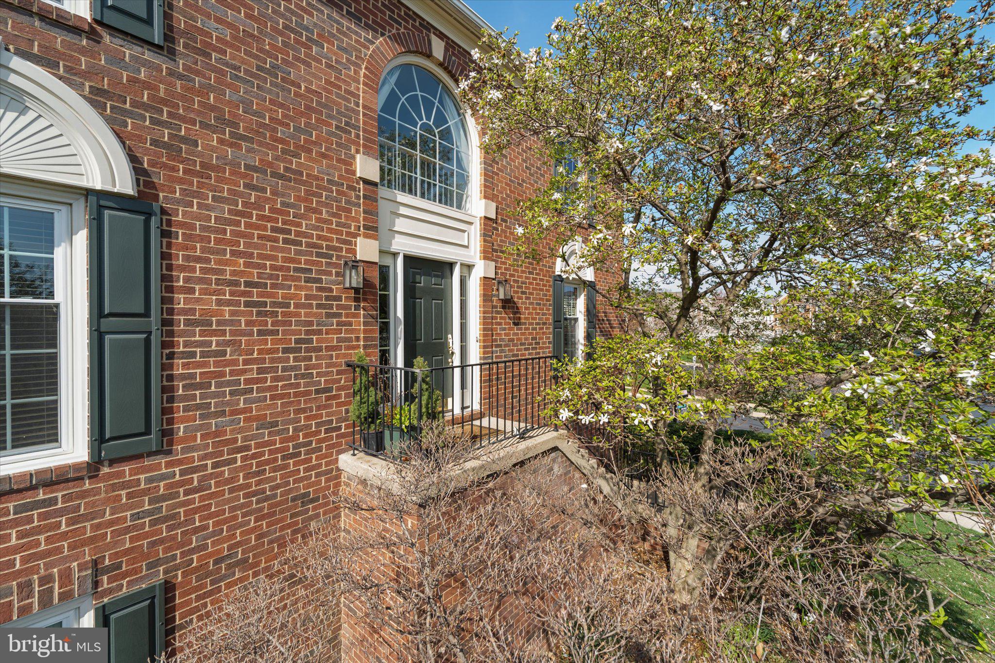 43451 Livery Square Ashburn, VA 20147 - Photo 7 of 51 a view of a house with a yard