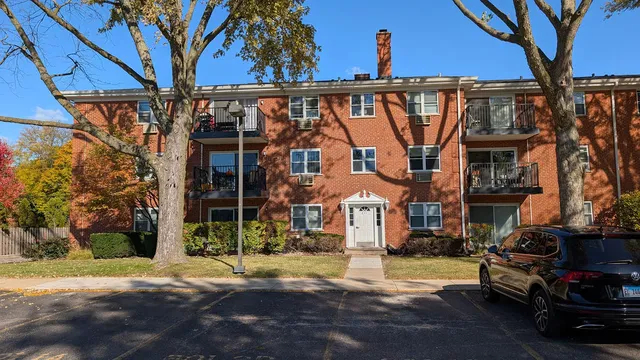 a view of a house with a street