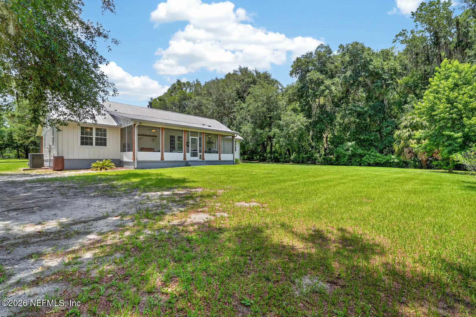 264 Peniel Church Road Palatka, FL 32177 - Photo 34 of 48 a view of a house with a yard