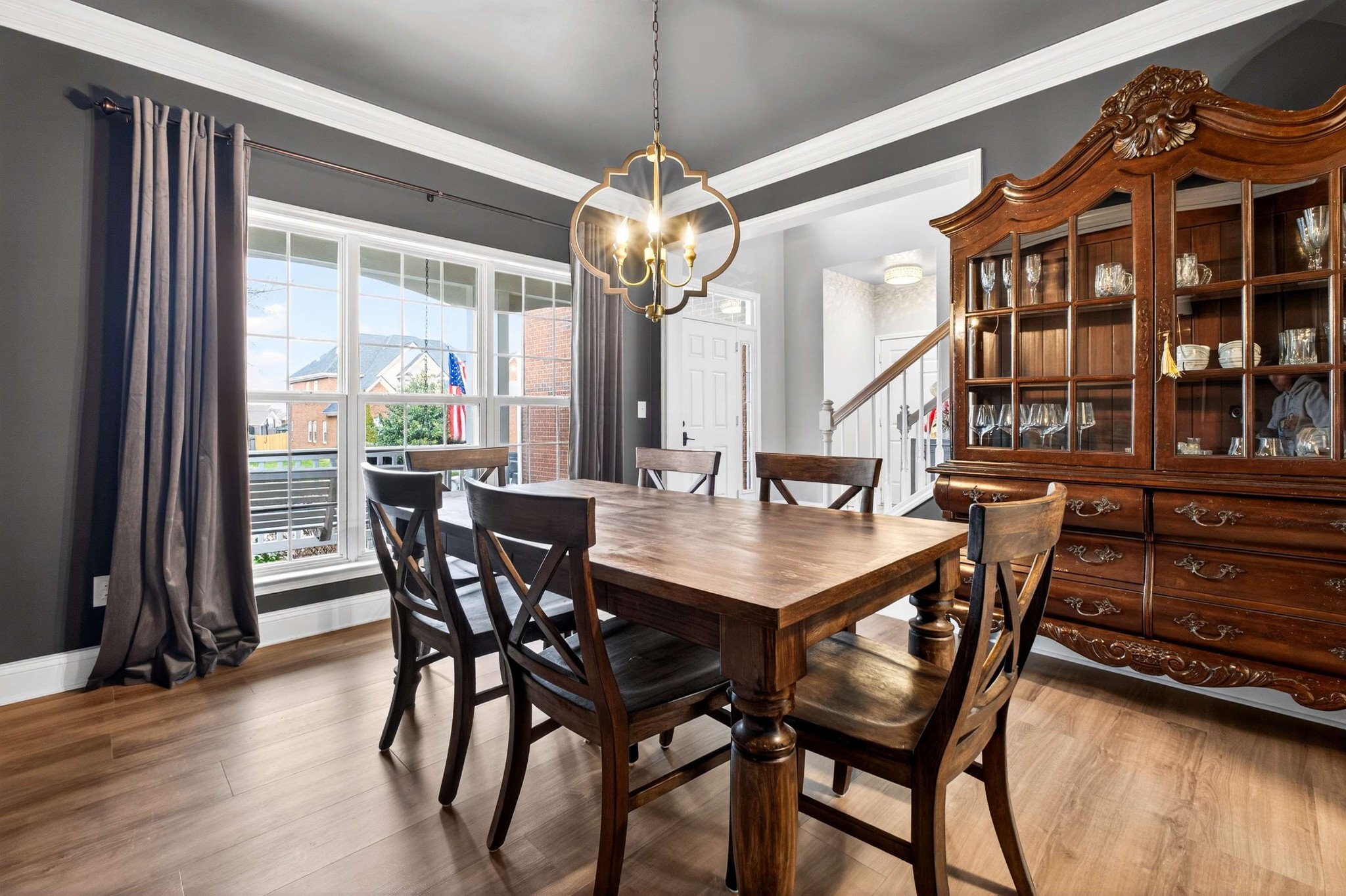 1012 Belcor Drive Spring Hill, TN 37174 - Photo 11 of 40 a view of a dining room with furniture and wooden floor
