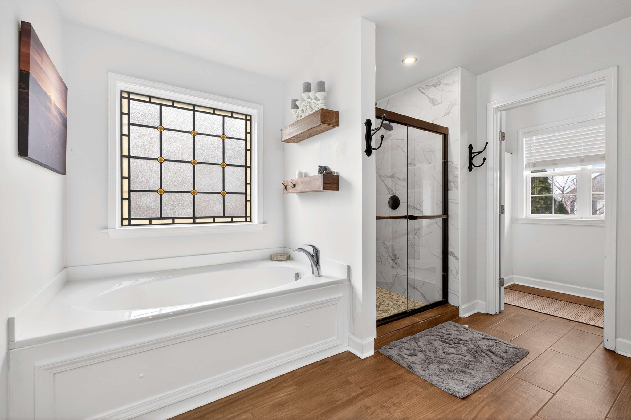 1012 Belcor Drive Spring Hill, TN 37174 - Photo 22 of 40 a bathroom with a bathtub and a shower