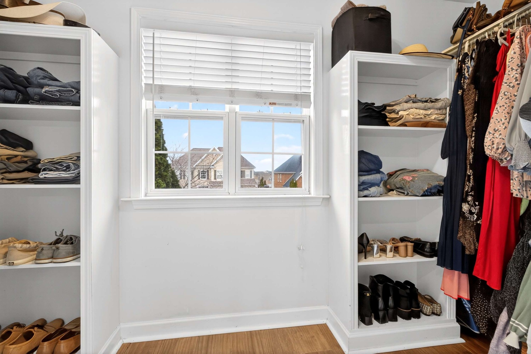 1012 Belcor Drive Spring Hill, TN 37174 - Photo 23 of 40 a view of walk in closet with clothes and shoes