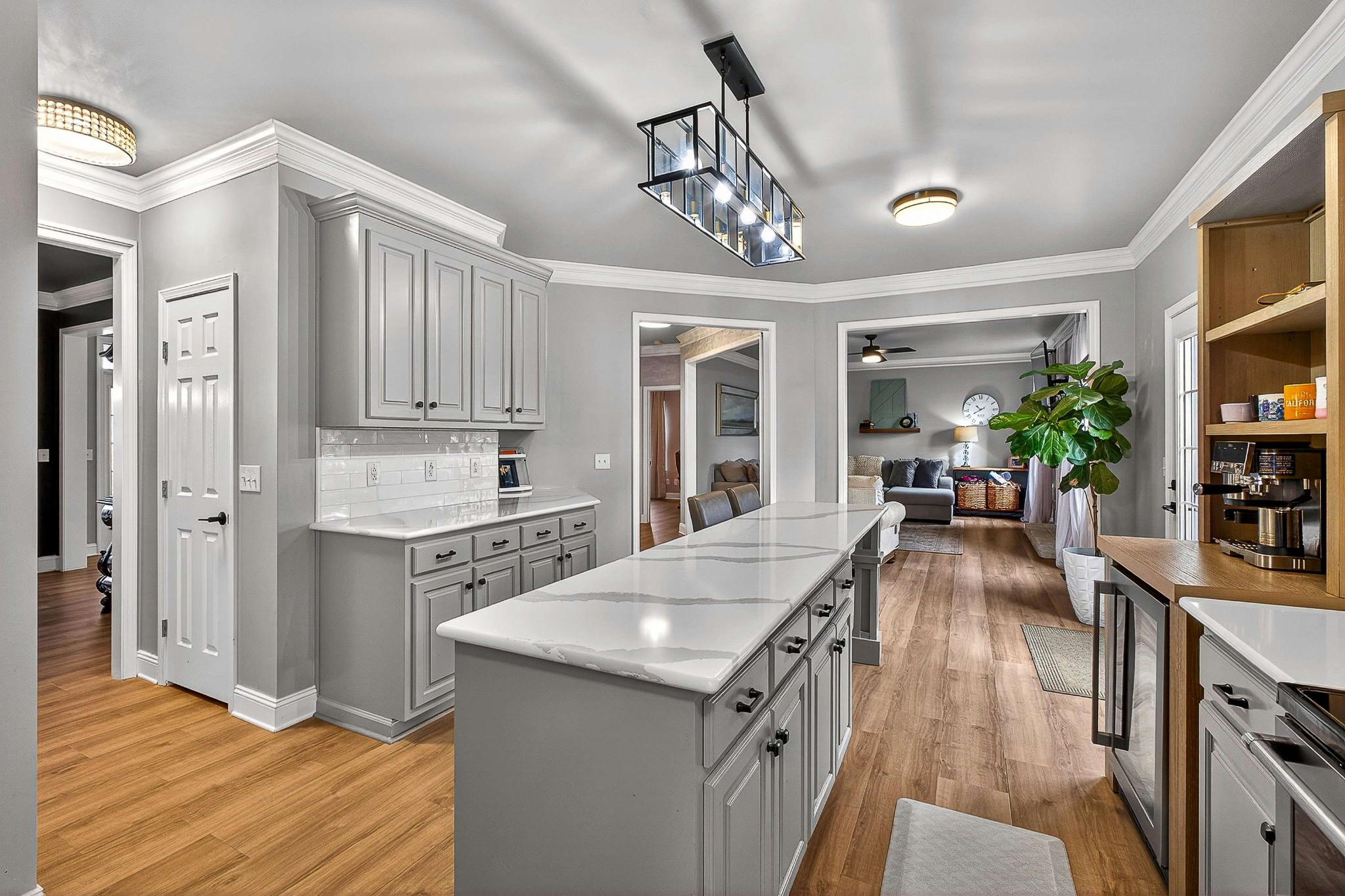 1012 Belcor Drive Spring Hill, TN 37174 - Photo 3 of 40 a kitchen with granite countertop a stove a sink dishwasher and a refrigerator with wooden floor